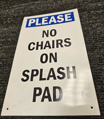 Wall Mounted Sign Please No Chairs On Splash Pad 16″ x 10″ Black on White