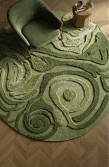 Floral round shape Moss Lush Tranquilty High Low Tufted handmade Moss Green rug.