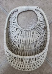 Basket Wall Hanging with Purple Flowers and Greenery.