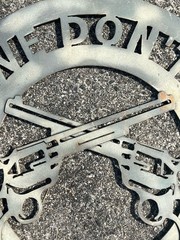 Rustic “We Don’t Call 911” Cut Out Revolvers Steel Round Sign