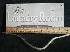«The Laundry Room Loads Of Fun» Rectangular Sign! Approx 5″X10″ Twine Hanger.