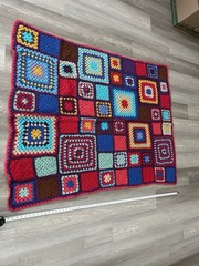 Vintage 48” x 62” Crochet Granny Square Colorful Afghan. 48 large squares