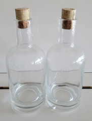2 THICK GLASS CLEAR BOTTLES APOTHECARY WITH CORK LIDS 7 INCHES HOLDS 8 OZS