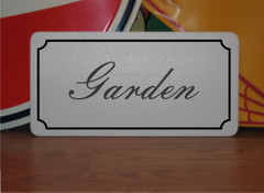 Garden Metal Sign in Fancy Script and Black Border