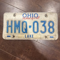 1996 Ohio license plate HMQ 038 Lake county Heart Of It All