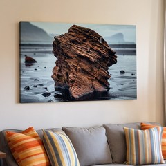 Large, Rugged Rock Formation Dominates The Center Of The Wall Art Canvas Print