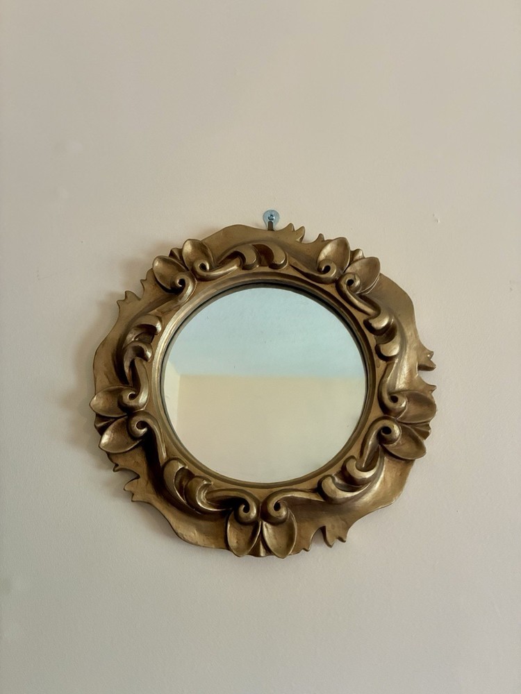 small Ornate accent mirror