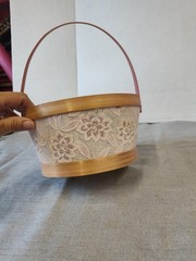 Wicker Basket With Pink Ribbon To Plant Flowers