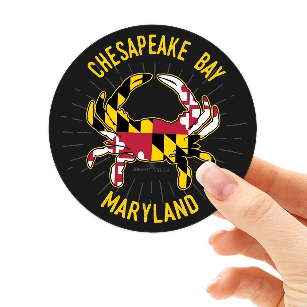 Dark Grey Background With Yellow, Red, White, and Black Crab. Yellow Lettering.