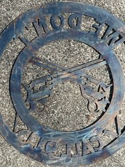 Rustic “We Don’t Call 911” Cut Out Revolvers Steel Round Sign