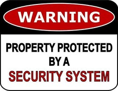 PCSCP Warning Property Protected By A Security System 11 inch by 9.5 inch Lamina
