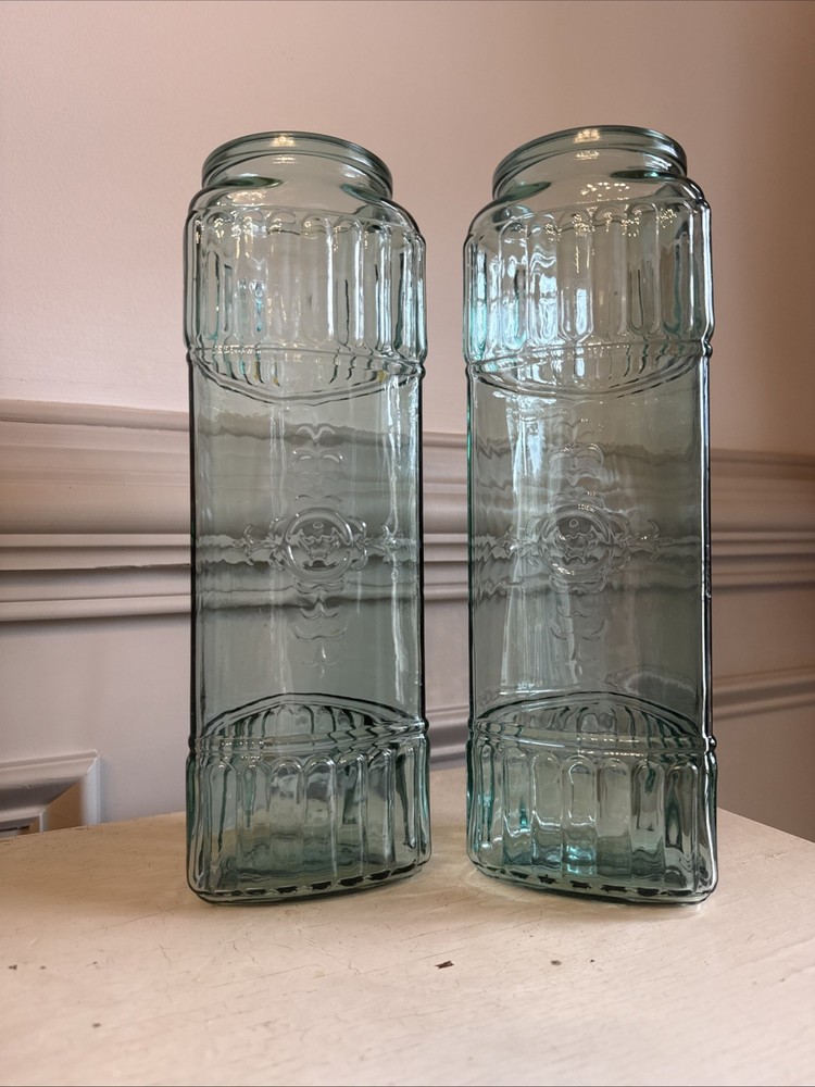 Two Turquoise 3-sided Storage Jars Embossed Design Glass 11.5″