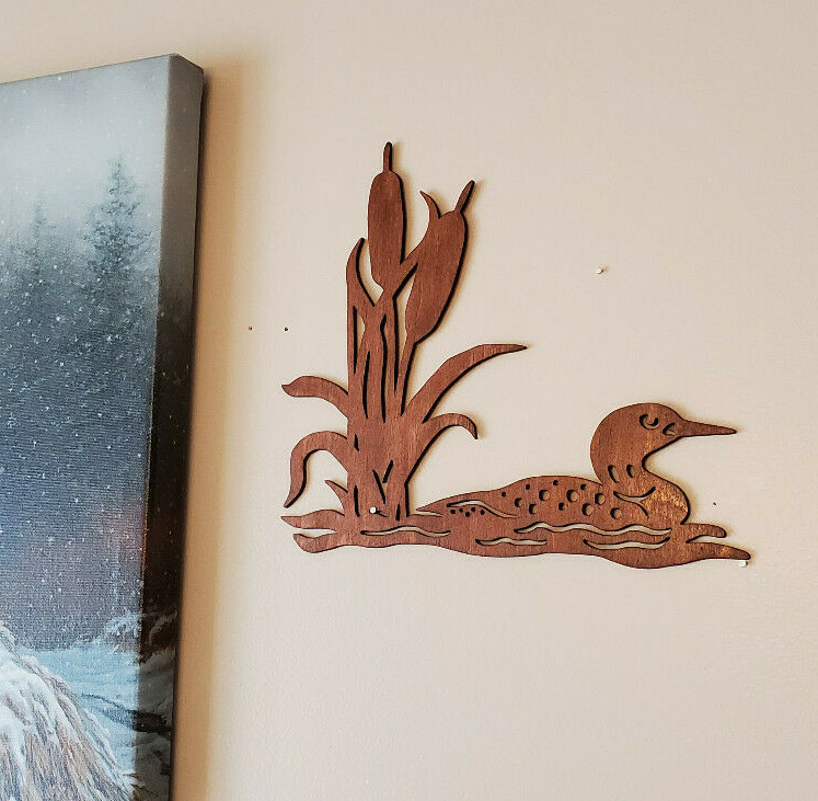 Beautiful Custom made Loon With Cattails accent for your picture arrangements.