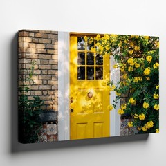 Vibrant Yellow Front Door Stands Prominently Against A Textured Brick Wall Art