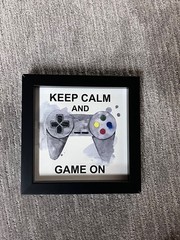 “Keep Calm and Game On” wooden decor piece. 9 1/4 x 9 1/4 x 1 1/2 inches