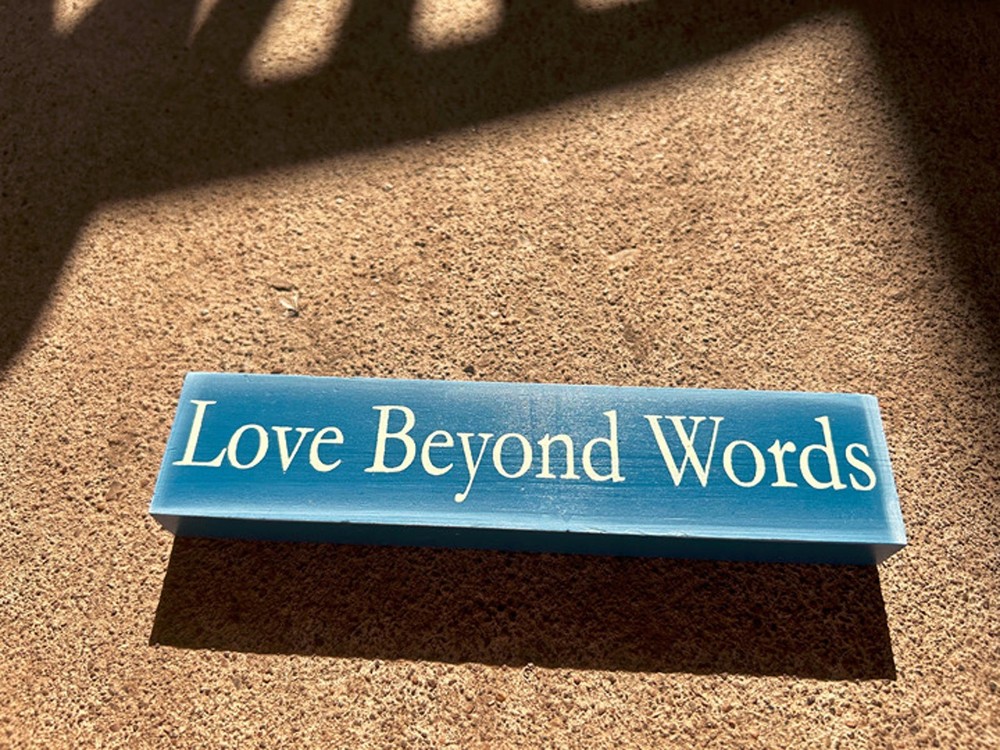 Love Beyond Words wood block