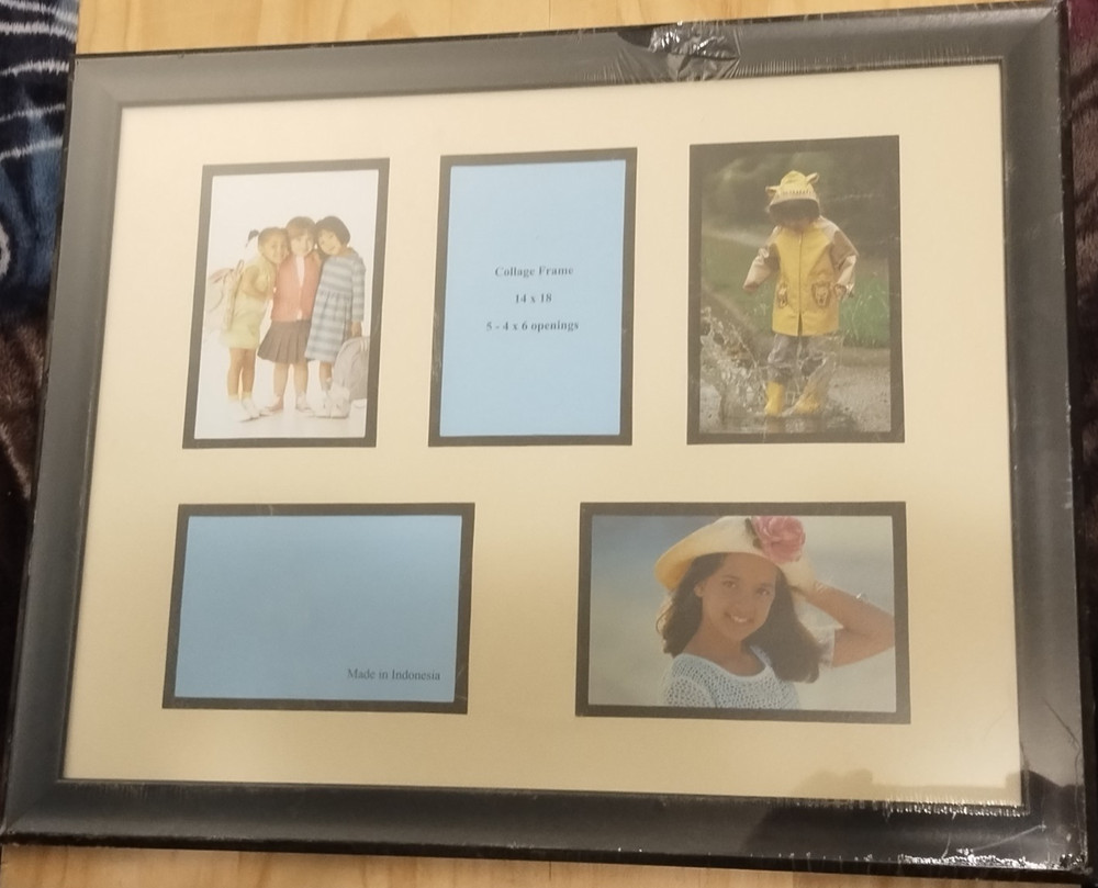 black collage frame features 5 openings for photos up to 14×18 inches