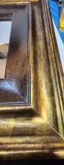 square mirror faux alligator textured inner frame and gold toned outer frame