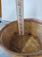 Wicker Basket With Pink Ribbon To Plant Flowers