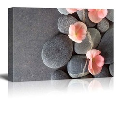 Wall26 – Peach Colored Flower on Smooth Zen Stones – Canvas Art – 24×36 inches