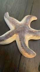 Set of 2 Beige & Purple Ceramic Starfish Wall Plaques 6”